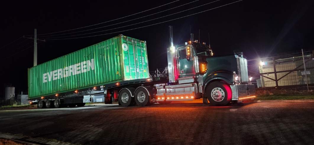 All Tow tilt tray hauling container Hoppers Crossing